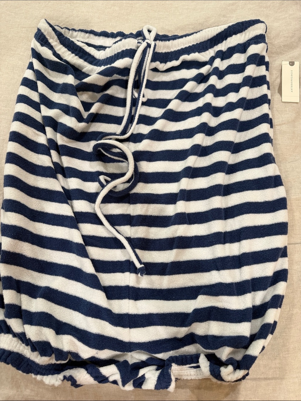 Navy and white romper with elastic on legs. Perfect for cover up